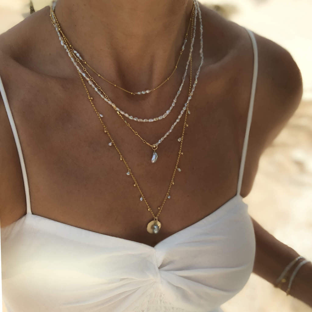 Delicate And Layered White Pearl Bridal Jewelry Sets